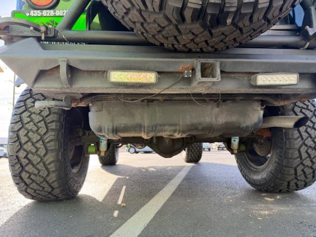 2006 Black Clearcoat/Dark Khaki Soft Top /Dark Slate Gray Jeep Wrangler Unlimited LJ (1J4FA44SX6P) with an Power Tech 4L I-6 regular gasoline engine, Automatic transmission, located at 1865 East Red Hills Pkwy, St. George, 84770, (435) 628-0023, 37.120850, -113.543640 - Versatile Southern Utah travel starts with this 2006 Jeep Wrangler Unlimited LJ LONG WHEEL BASE. Its 4.0L inline 6-cylinder, 4-speed automatic, and 4x4 make it a smart fit for trail exploring, camping trips, and outdoor weekends. With 117,500 miles, this Wrangler is ready for its next adventure. Th- Photo#15