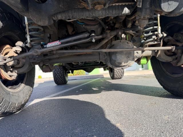 2006 Black Clearcoat/Dark Khaki Soft Top /Dark Slate Gray Jeep Wrangler Unlimited LJ (1J4FA44SX6P) with an Power Tech 4L I-6 regular gasoline engine, Automatic transmission, located at 1865 East Red Hills Pkwy, St. George, 84770, (435) 628-0023, 37.120850, -113.543640 - Versatile Southern Utah travel starts with this 2006 Jeep Wrangler Unlimited LJ LONG WHEEL BASE. Its 4.0L inline 6-cylinder, 4-speed automatic, and 4x4 make it a smart fit for trail exploring, camping trips, and outdoor weekends. With 117,500 miles, this Wrangler is ready for its next adventure. Th- Photo#16