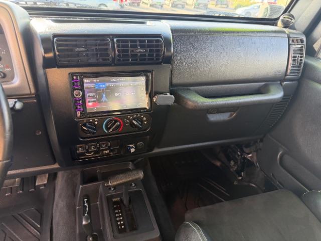 2006 Black Clearcoat/Dark Khaki Soft Top /Dark Slate Gray Jeep Wrangler Unlimited LJ (1J4FA44SX6P) with an Power Tech 4L I-6 regular gasoline engine, Automatic transmission, located at 1865 East Red Hills Pkwy, St. George, 84770, (435) 628-0023, 37.120850, -113.543640 - Versatile Southern Utah travel starts with this 2006 Jeep Wrangler Unlimited LJ LONG WHEEL BASE. Its 4.0L inline 6-cylinder, 4-speed automatic, and 4x4 make it a smart fit for trail exploring, camping trips, and outdoor weekends. With 117,500 miles, this Wrangler is ready for its next adventure. Th- Photo#19