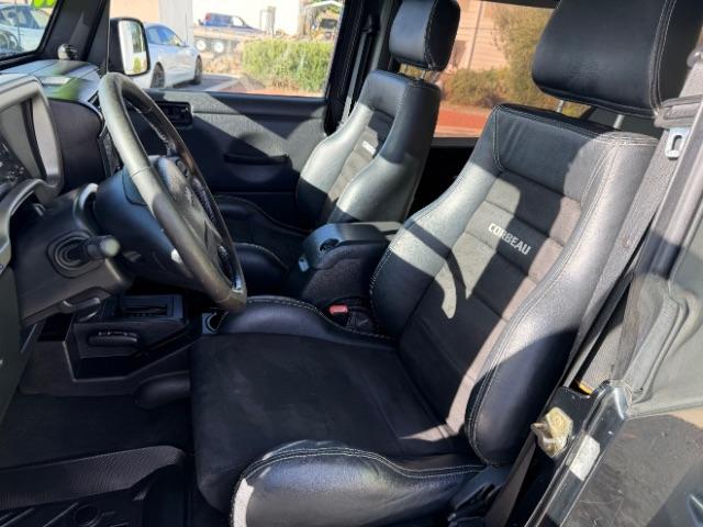 2006 Black Clearcoat/Dark Khaki Soft Top /Dark Slate Gray Jeep Wrangler Unlimited LJ (1J4FA44SX6P) with an Power Tech 4L I-6 regular gasoline engine, Automatic transmission, located at 1865 East Red Hills Pkwy, St. George, 84770, (435) 628-0023, 37.120850, -113.543640 - Versatile Southern Utah travel starts with this 2006 Jeep Wrangler Unlimited LJ LONG WHEEL BASE. Its 4.0L inline 6-cylinder, 4-speed automatic, and 4x4 make it a smart fit for trail exploring, camping trips, and outdoor weekends. With 117,500 miles, this Wrangler is ready for its next adventure. Th- Photo#22