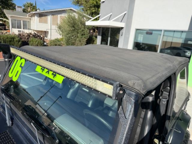 2006 Black Clearcoat/Dark Khaki Soft Top /Dark Slate Gray Jeep Wrangler Unlimited LJ (1J4FA44SX6P) with an Power Tech 4L I-6 regular gasoline engine, Automatic transmission, located at 1865 East Red Hills Pkwy, St. George, 84770, (435) 628-0023, 37.120850, -113.543640 - Versatile Southern Utah travel starts with this 2006 Jeep Wrangler Unlimited LJ LONG WHEEL BASE. Its 4.0L inline 6-cylinder, 4-speed automatic, and 4x4 make it a smart fit for trail exploring, camping trips, and outdoor weekends. With 117,500 miles, this Wrangler is ready for its next adventure. Th- Photo#23