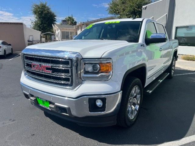 2015 Summit White /Cocoa/Dune GMC Sierra 1500 SLT (3GTU2VEC6FG) , Automatic transmission, located at 1865 East Red Hills Pkwy, St. George, 84770, (435) 628-0023, 37.120850, -113.543640 - Versatile Southern Utah travel starts with this 2015 GMC Sierra 1500 SLT Crew Cab. Its 5.3L V8, 6-speed automatic, and 4WD make it a smart fit for work days, weekend projects, and outdoor trips. With 112,695 miles, this Sierra is ready for its next adventure. The SLT adds air conditioning, alloy wh- Photo#2