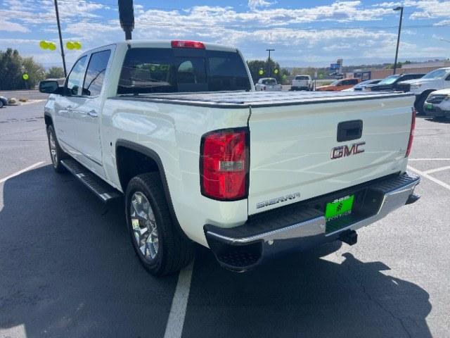 2015 Summit White /Cocoa/Dune GMC Sierra 1500 SLT (3GTU2VEC6FG) , Automatic transmission, located at 1865 East Red Hills Pkwy, St. George, 84770, (435) 628-0023, 37.120850, -113.543640 - Versatile Southern Utah travel starts with this 2015 GMC Sierra 1500 SLT Crew Cab. Its 5.3L V8, 6-speed automatic, and 4WD make it a smart fit for work days, weekend projects, and outdoor trips. With 112,695 miles, this Sierra is ready for its next adventure. The SLT adds air conditioning, alloy wh- Photo#4