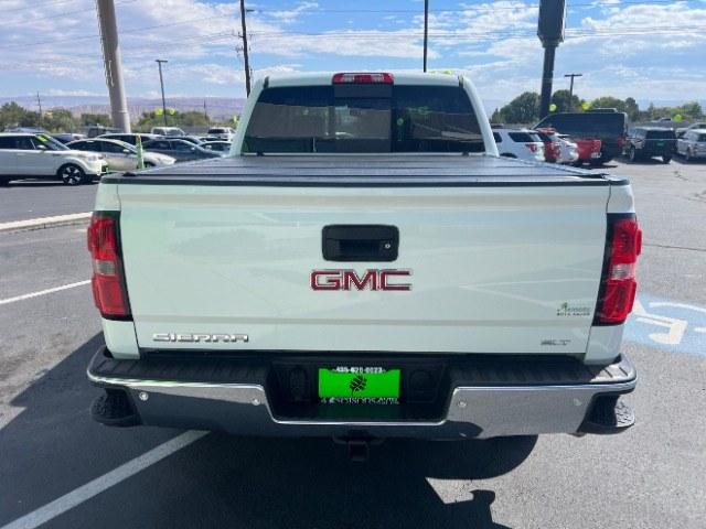2015 Summit White /Cocoa/Dune GMC Sierra 1500 SLT (3GTU2VEC6FG) , Automatic transmission, located at 1865 East Red Hills Pkwy, St. George, 84770, (435) 628-0023, 37.120850, -113.543640 - Versatile Southern Utah travel starts with this 2015 GMC Sierra 1500 SLT Crew Cab. Its 5.3L V8, 6-speed automatic, and 4WD make it a smart fit for work days, weekend projects, and outdoor trips. With 112,695 miles, this Sierra is ready for its next adventure. The SLT adds air conditioning, alloy wh- Photo#5
