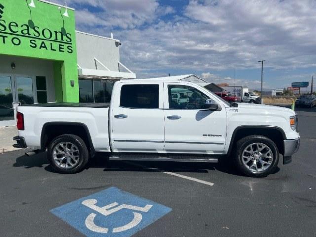 2015 Summit White /Cocoa/Dune GMC Sierra 1500 SLT (3GTU2VEC6FG) , Automatic transmission, located at 1865 East Red Hills Pkwy, St. George, 84770, (435) 628-0023, 37.120850, -113.543640 - Versatile Southern Utah travel starts with this 2015 GMC Sierra 1500 SLT Crew Cab. Its 5.3L V8, 6-speed automatic, and 4WD make it a smart fit for work days, weekend projects, and outdoor trips. With 112,695 miles, this Sierra is ready for its next adventure. The SLT adds air conditioning, alloy wh- Photo#7