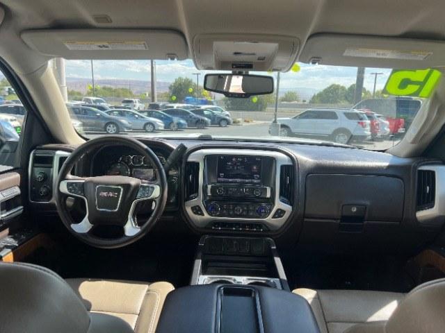 2015 Summit White /Cocoa/Dune GMC Sierra 1500 SLT (3GTU2VEC6FG) , Automatic transmission, located at 1865 East Red Hills Pkwy, St. George, 84770, (435) 628-0023, 37.120850, -113.543640 - Versatile Southern Utah travel starts with this 2015 GMC Sierra 1500 SLT Crew Cab. Its 5.3L V8, 6-speed automatic, and 4WD make it a smart fit for work days, weekend projects, and outdoor trips. With 112,695 miles, this Sierra is ready for its next adventure. The SLT adds air conditioning, alloy wh- Photo#23