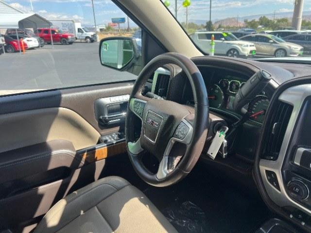 2015 Summit White /Cocoa/Dune GMC Sierra 1500 SLT (3GTU2VEC6FG) , Automatic transmission, located at 1865 East Red Hills Pkwy, St. George, 84770, (435) 628-0023, 37.120850, -113.543640 - Versatile Southern Utah travel starts with this 2015 GMC Sierra 1500 SLT Crew Cab. Its 5.3L V8, 6-speed automatic, and 4WD make it a smart fit for work days, weekend projects, and outdoor trips. With 112,695 miles, this Sierra is ready for its next adventure. The SLT adds air conditioning, alloy wh- Photo#30