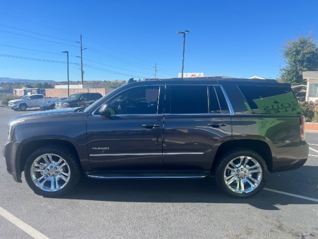 2016 Light Steel Gray Metallic /Jet Black GMC Yukon SLT (1GKS1BKC1GR) with an EcoTec3 5.3L V-8 gasoline direct injection engine, Automatic transmission, located at 1865 East Red Hills Pkwy, St. George, 84770, (435) 628-0023, 37.120850, -113.543640 - Versatile Southern Utah travel starts with this 2016 GMC Yukon SLT. Its 355 hp 5.3L EcoTec3 V8, 6-speed automatic transmission, and rear-wheel drive make it a smart fit for family trips, team hauling, and road trips from St George to Cedar City. With 118,972 miles, this Yukon is ready for its next a- Photo#3